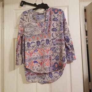 Tunic top with a unique color and pattern. size L